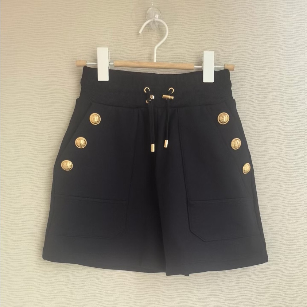 Authentic Balmain Black Garment with Gold Accents